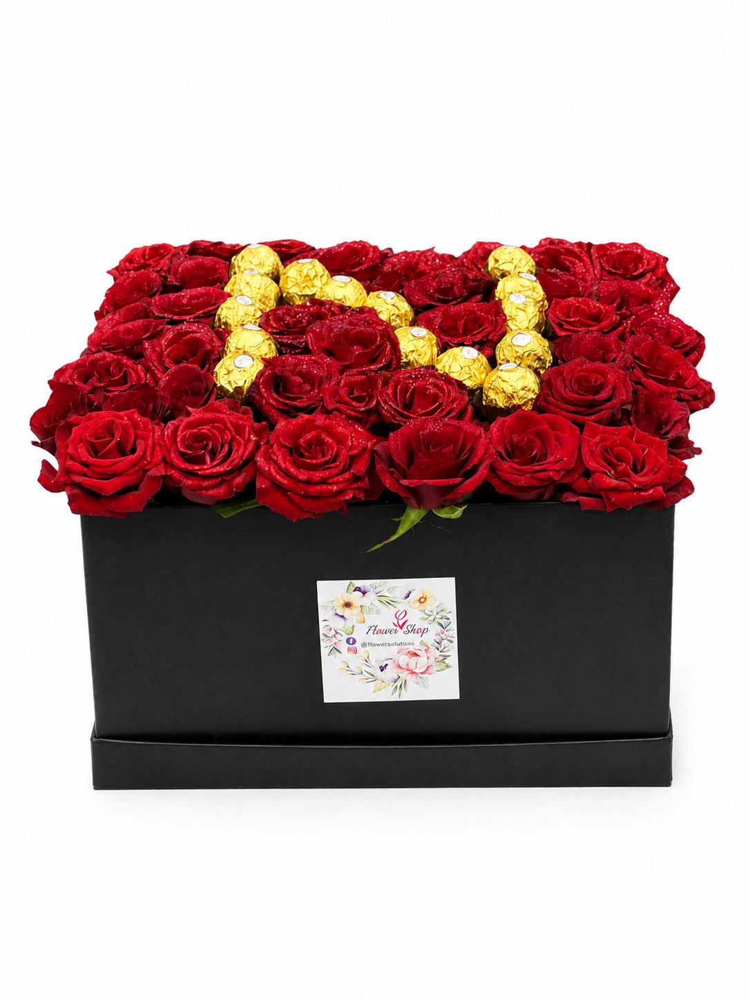 Box of roses with letter by chocolate